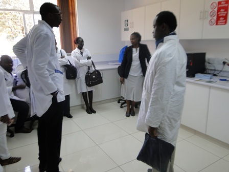 Photo: A research scientist , underscores a point to CEBIB postgraduates, African Reference Lab for Bee Health, ICIPE 